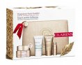 Clarins Nutri-Lumiere Набор Крем дневной 50мл+Криомаска 15мл+Крем ночной 15мл+Флюид 10мл+Косметичка